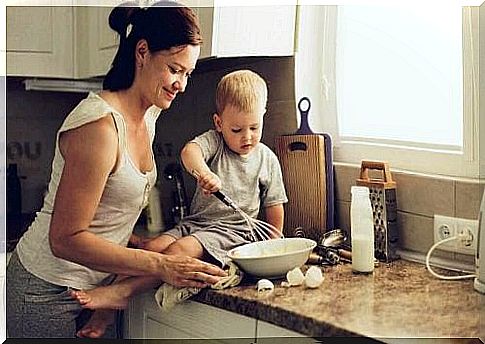 Children and mother bake together