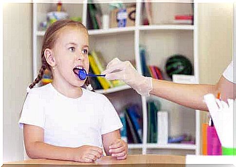 A girl undergoing speech therapy.