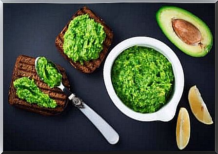 Pesto, avocado and guacamole on bread.