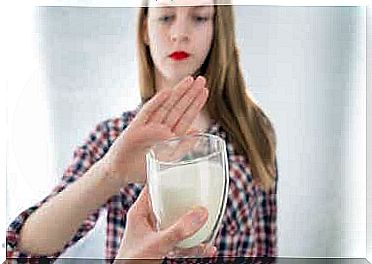 A woman suffering from lactose intolerance