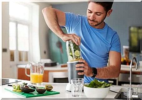 man making smoothie