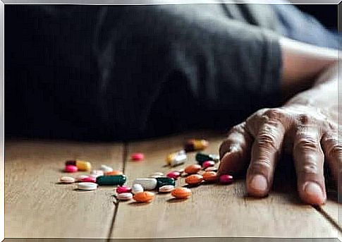 Person and pills.